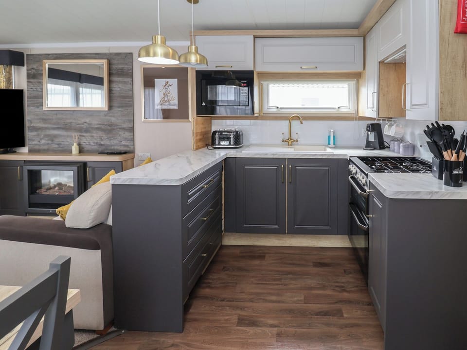 Fridge, microwave, toaster, cookware/dishes/utensils