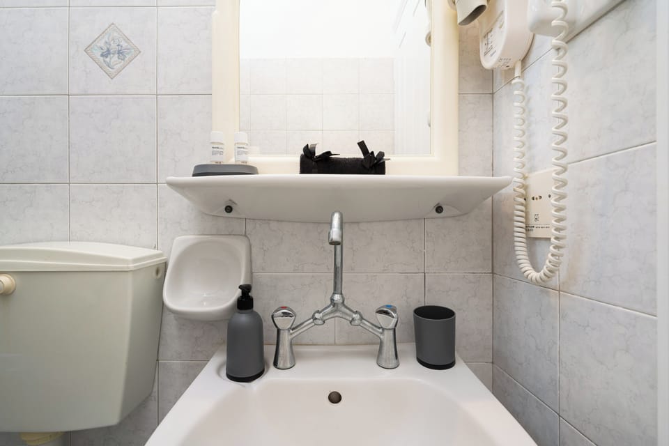 Bathroom | Shower, free toiletries, hair dryer, towels