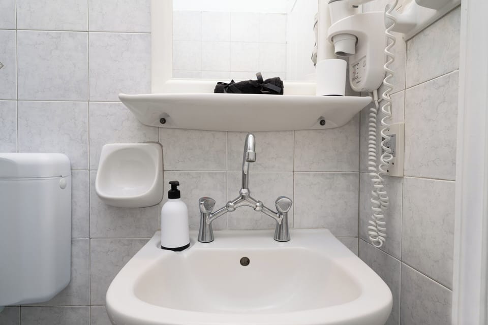 Bathroom | Shower, free toiletries, hair dryer, towels
