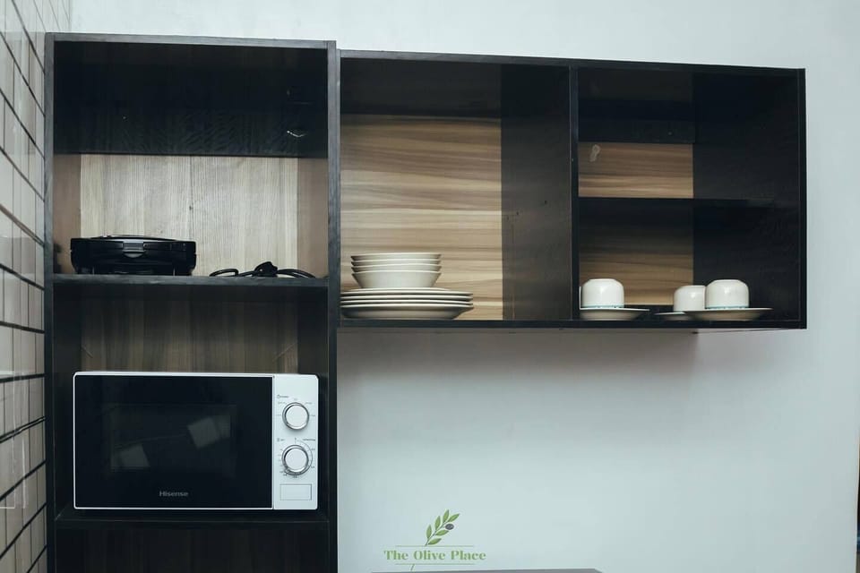 Deluxe Apartment, Balcony, City View | Private kitchen | Fridge, microwave, oven, stovetop