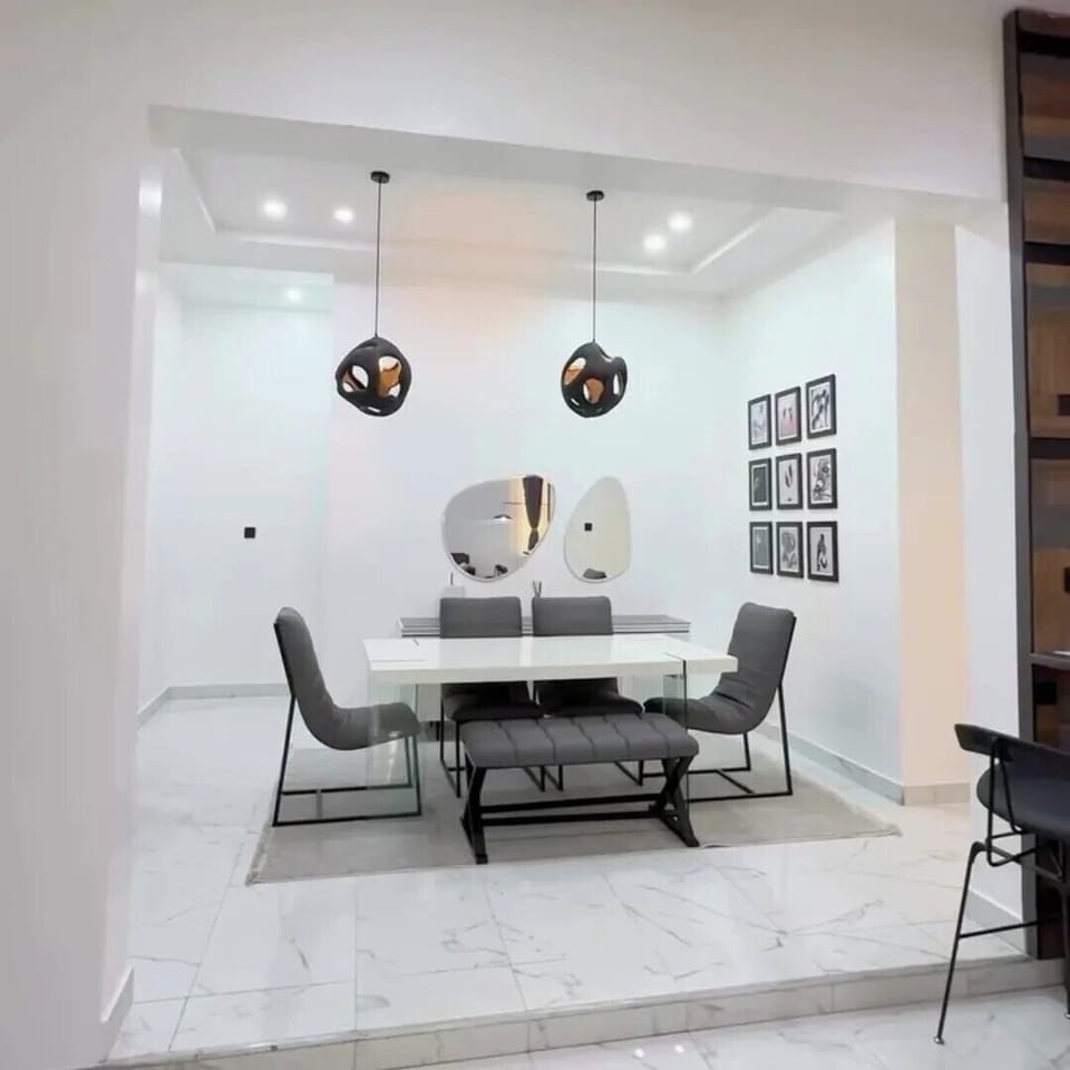 Deluxe Apartment, Balcony, City View | Dining room