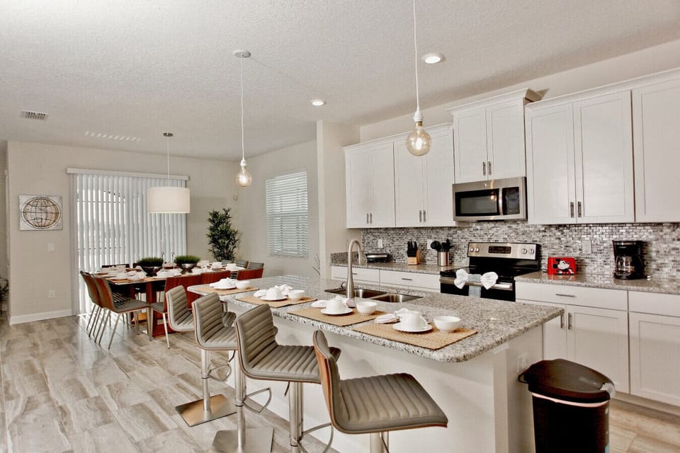 Open kitchen with dining space nearby