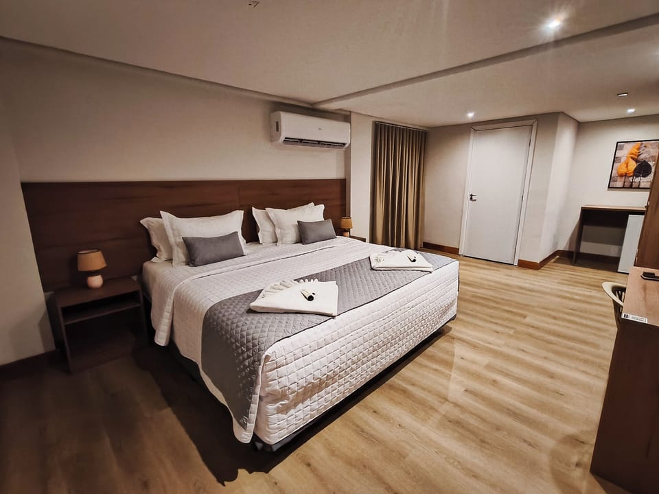 Premium bedding, pillowtop beds, minibar, laptop workspace