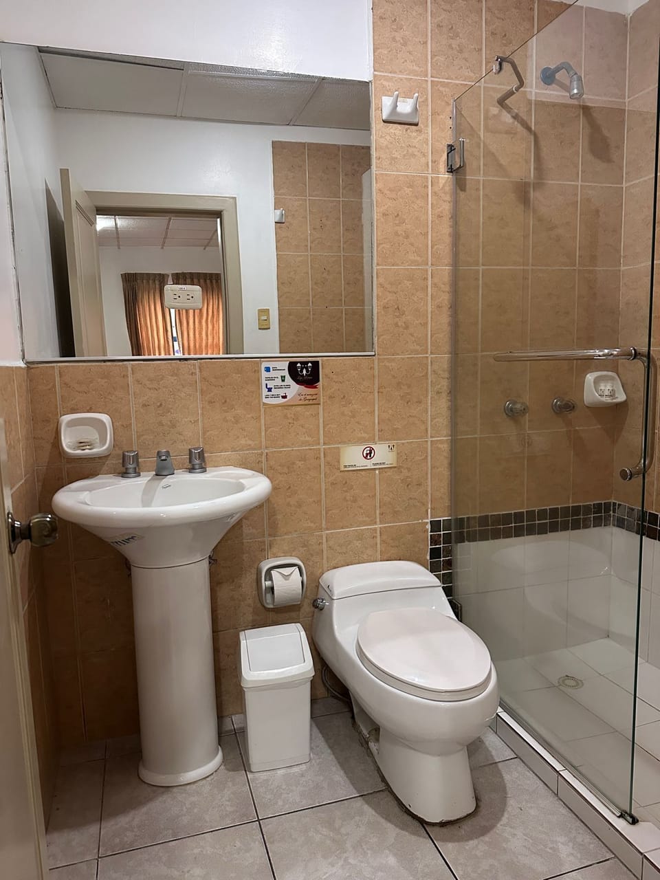 Shower, free toiletries, towels, soap