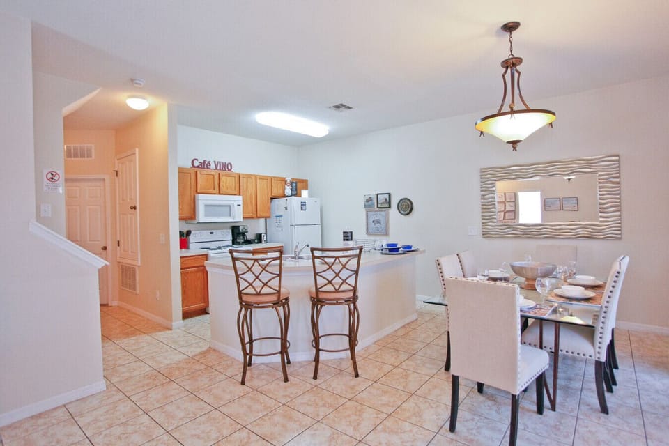 Dine together in a bright open kitchen space