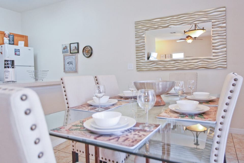 Dine together at a table set with stylish decor