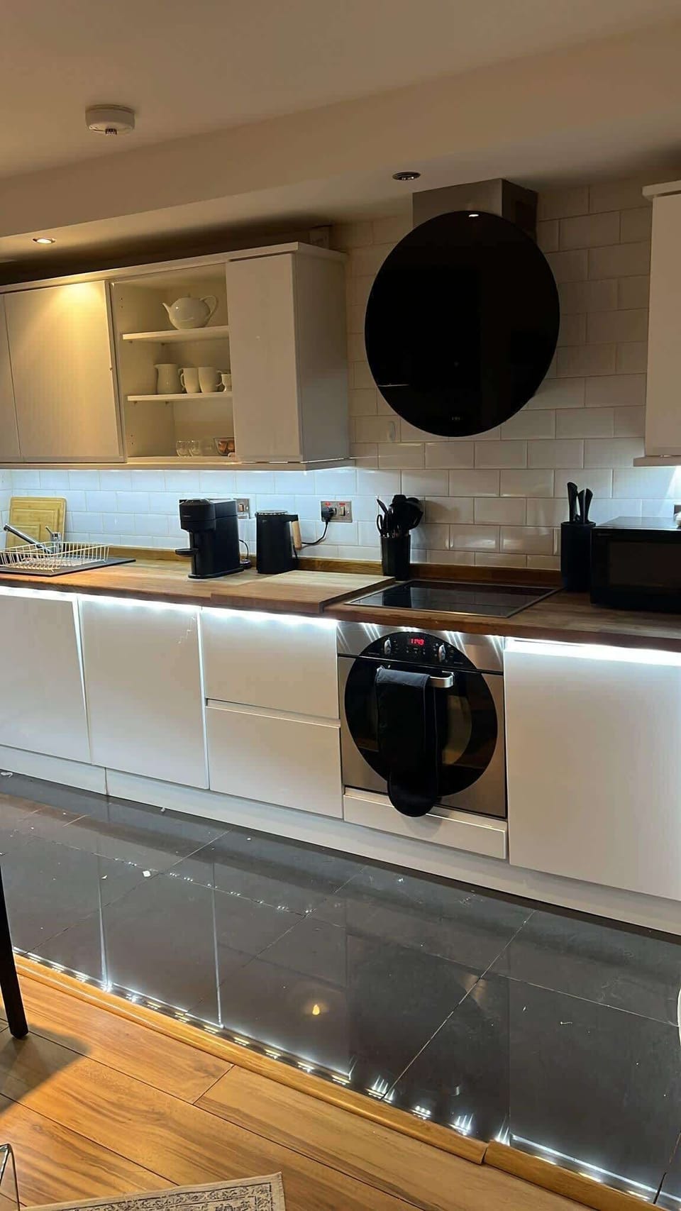 Full Kitchen with electric hobs, oven, microwave, toaster, kettle and Nespresso coffee machine