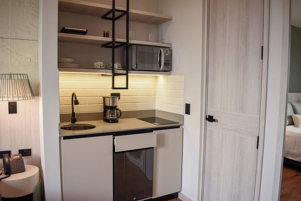 Superior Room | Private kitchen | Mini-fridge, microwave, stovetop, cookware/dishes/utensils