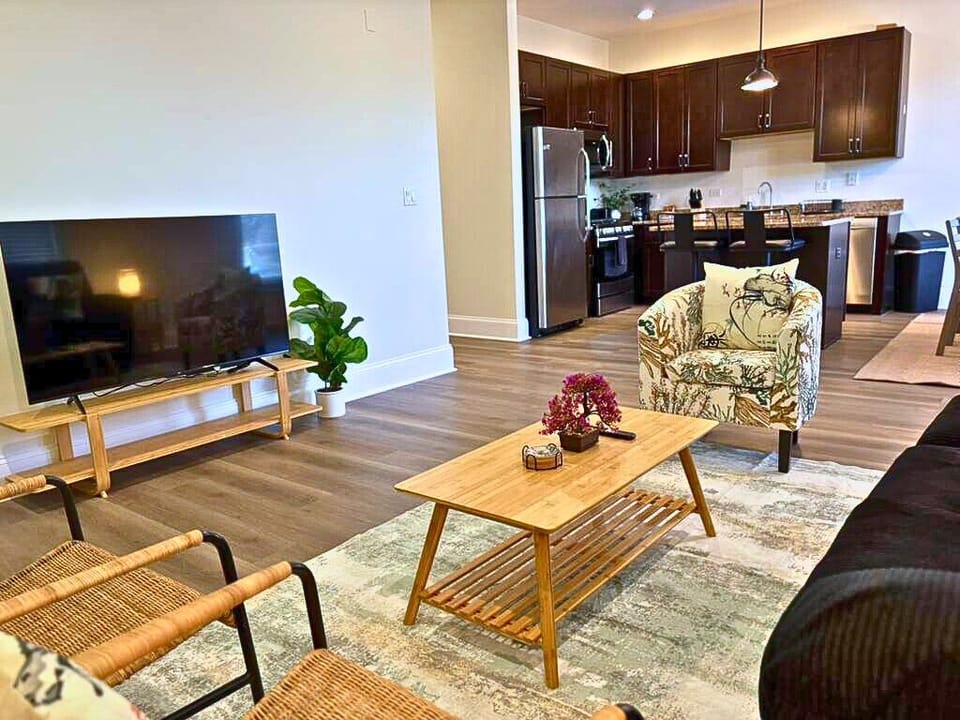 Classic Apartment, 2 Bedrooms | Living area | 55-inch TV with digital channels, streaming services