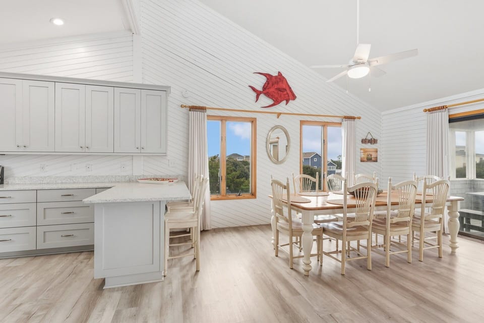 Cook up coastal favorites in the fully equipped kitchen with stainless steel appliances and bar seating.