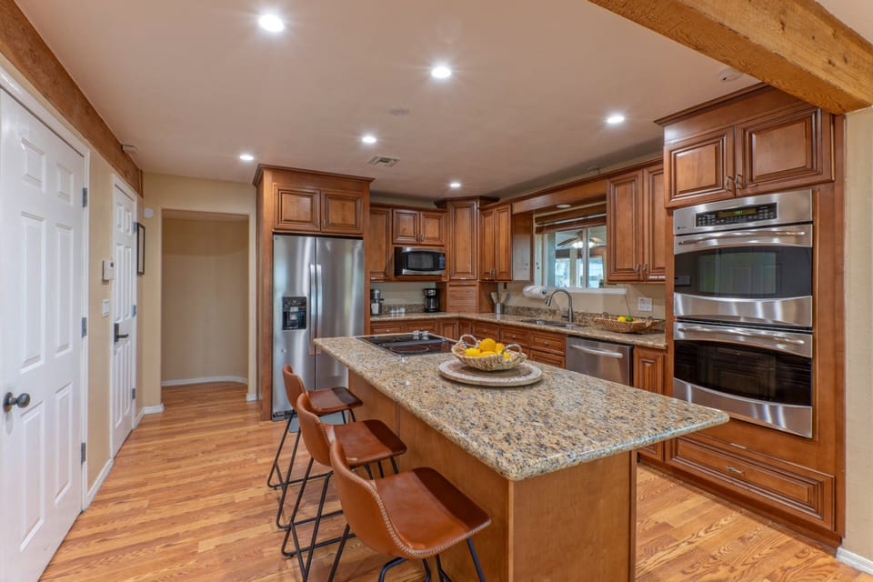 The second level kitchen in main home is completely stocked.