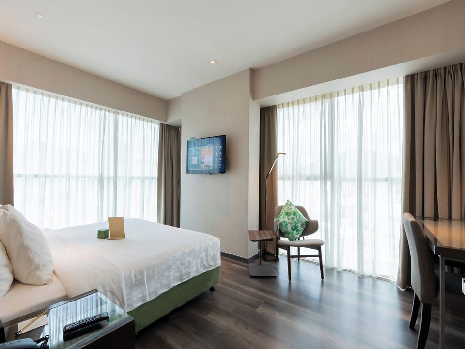 Olive Deluxe Room | Premium bedding, in-room safe, desk, laptop workspace