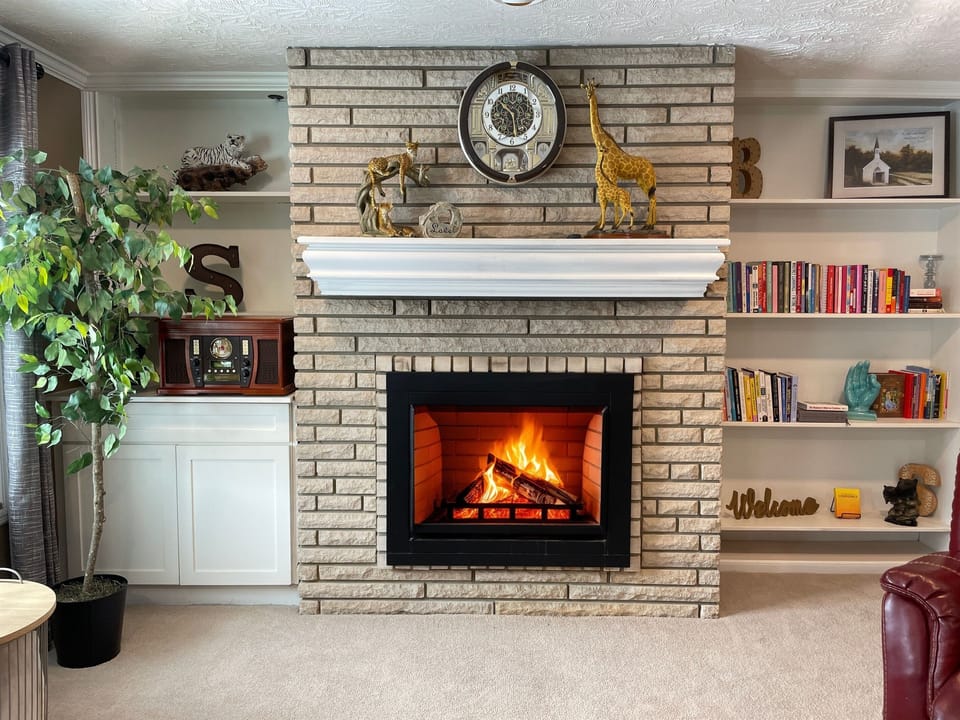 Whether it’s coffee and a book in the morning or movies at night, this cozy living room is designed with unwinding in mind.