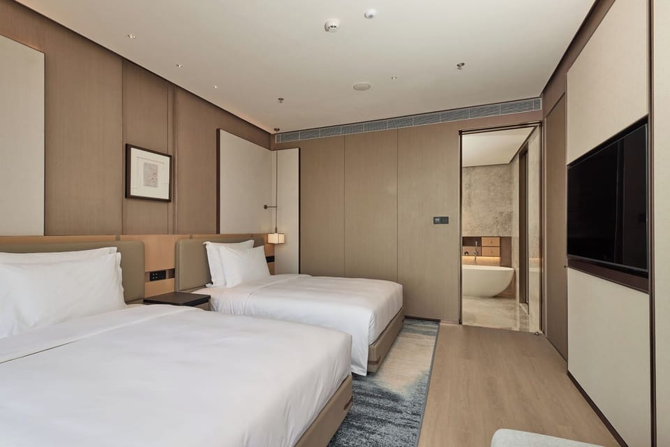 Superior Suite | Down comforters, minibar, in-room safe, desk