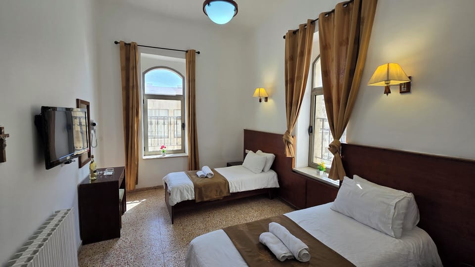 Twin Room (2 Single Beds) | Desk, laptop workspace, iron/ironing board, cribs/infant beds