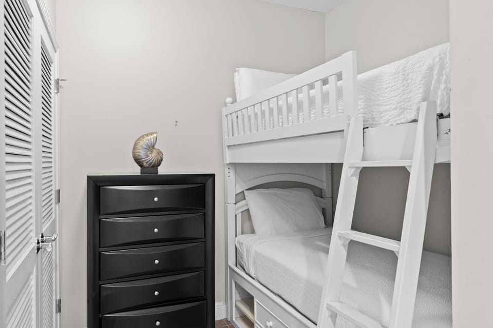 Bedroom 3 features twin single bunk bed.