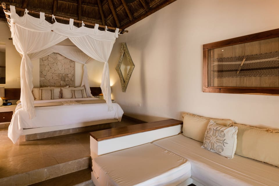 Premium bedding, down comforters, minibar, in-room safe