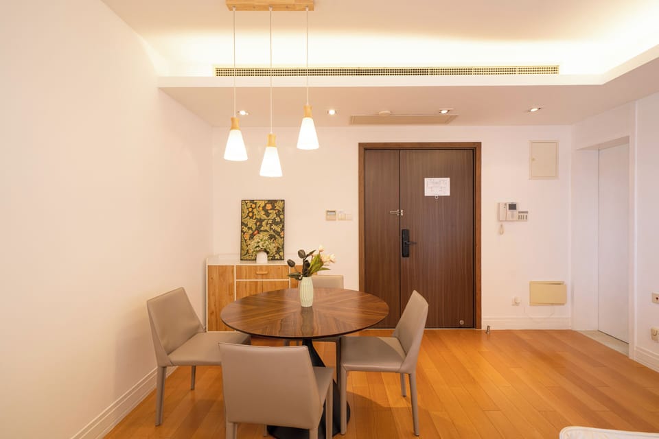 Superior Apartment, 3 Bedrooms, Balcony, City View | Living room | 55-inch Smart TV with cable channels