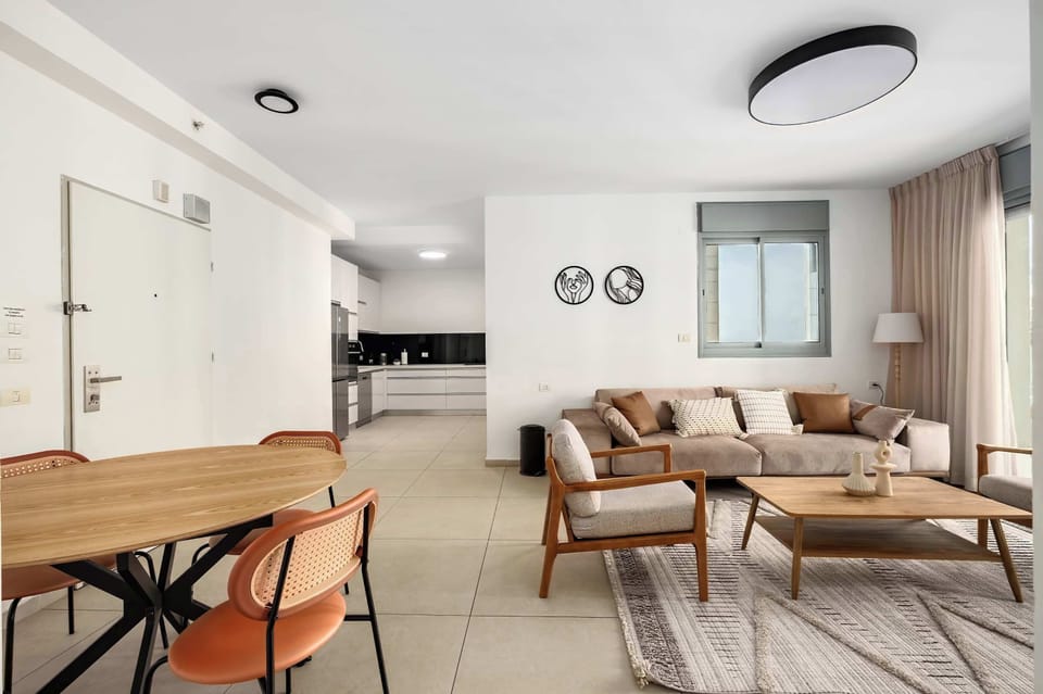 Dining area ideal for shared meals, remote work, or planning beach outings just minutes away.