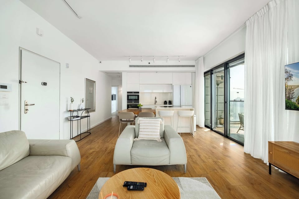 Open-plan layout feels wonderfully roomy, blending lounge, dining, and kitchen spaces for an easygoing stay.