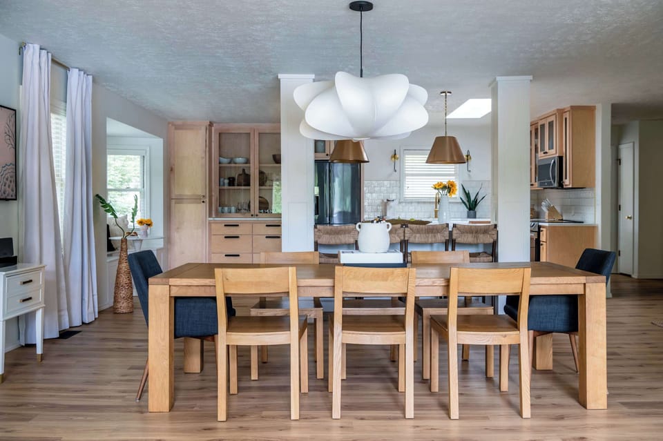 In this open concept space, you'll also find a dining table for 8 and our fully stocked kitchen!