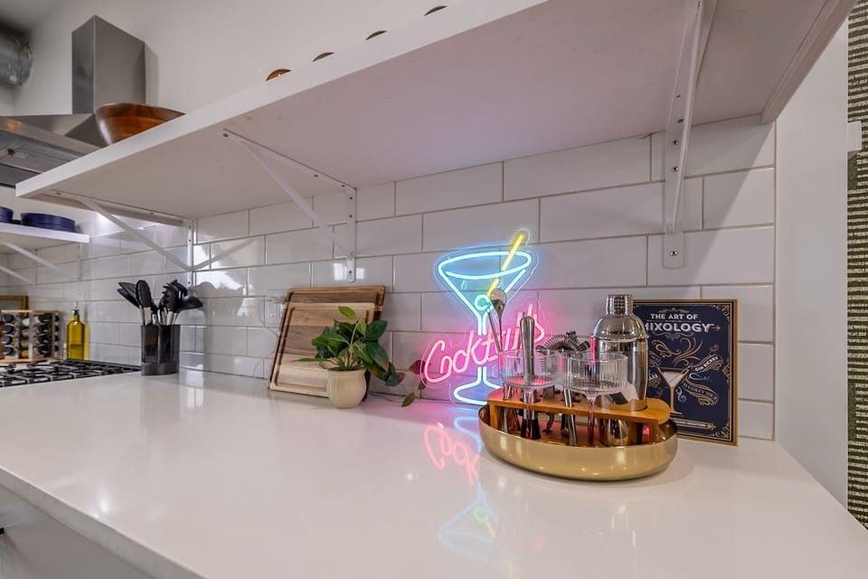Shake things up at your own cocktail corner 🍸✨ Fully stocked with stylish barware and good vibes only.