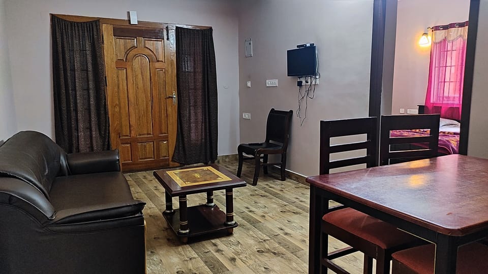Suite, Balcony, Hill View | Living area | Flat-screen TV