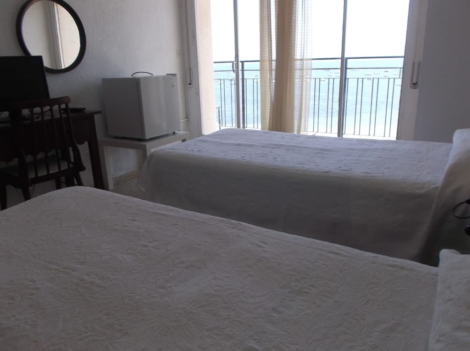 Minibar, desk, blackout drapes, free WiFi