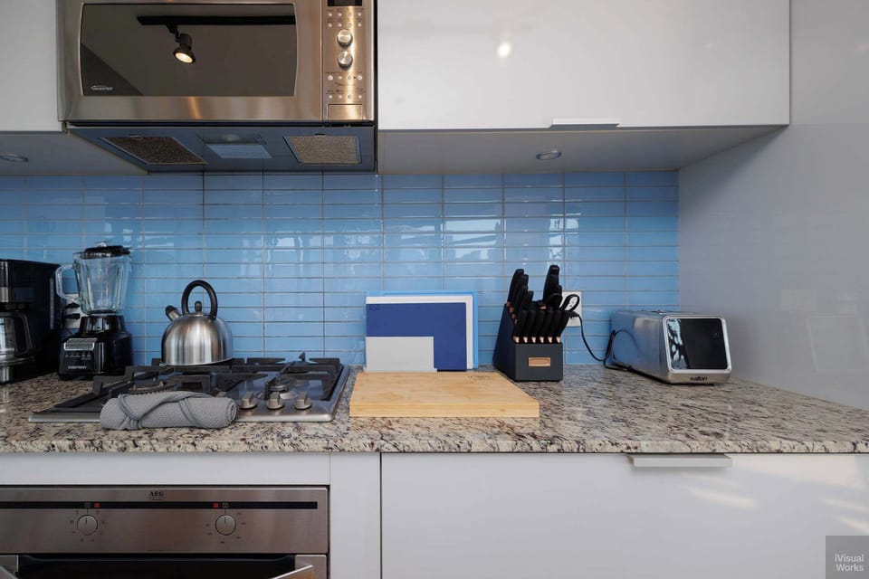 From the gas stovetop to the modern toaster and kettle, every detail has been considered. The kitchen is fully stocked with the essentials to make your stay as convenient and enjoyable as possible.