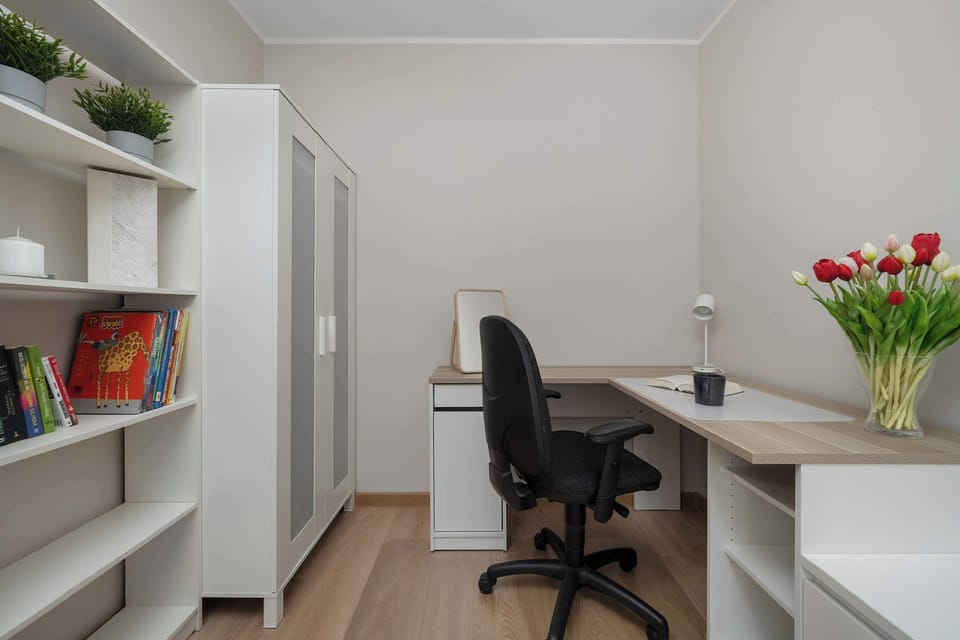 Enjoy the simplicity and comfort of the bedroom's modern design.