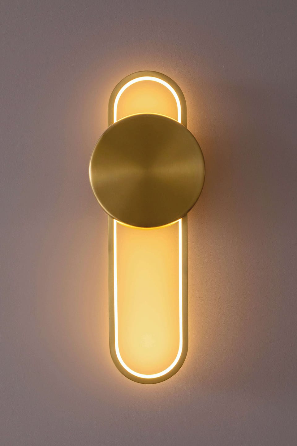 Stylish wall lamp with soft ambient lighting adding a warm touch to the interior.