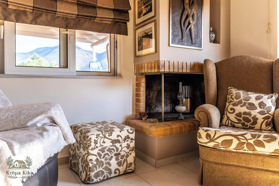 Cozy Fireplace Corner with Armchairs – Perfect nook for a warm evening indoors.