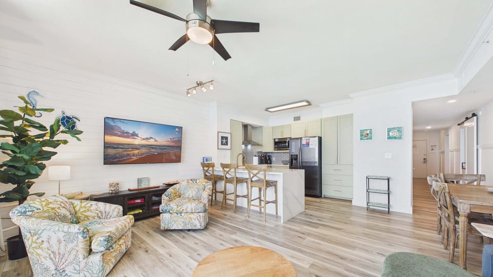 Open concept living area with TV and stylish furnishings with sleeper sofa (sleeps 2)