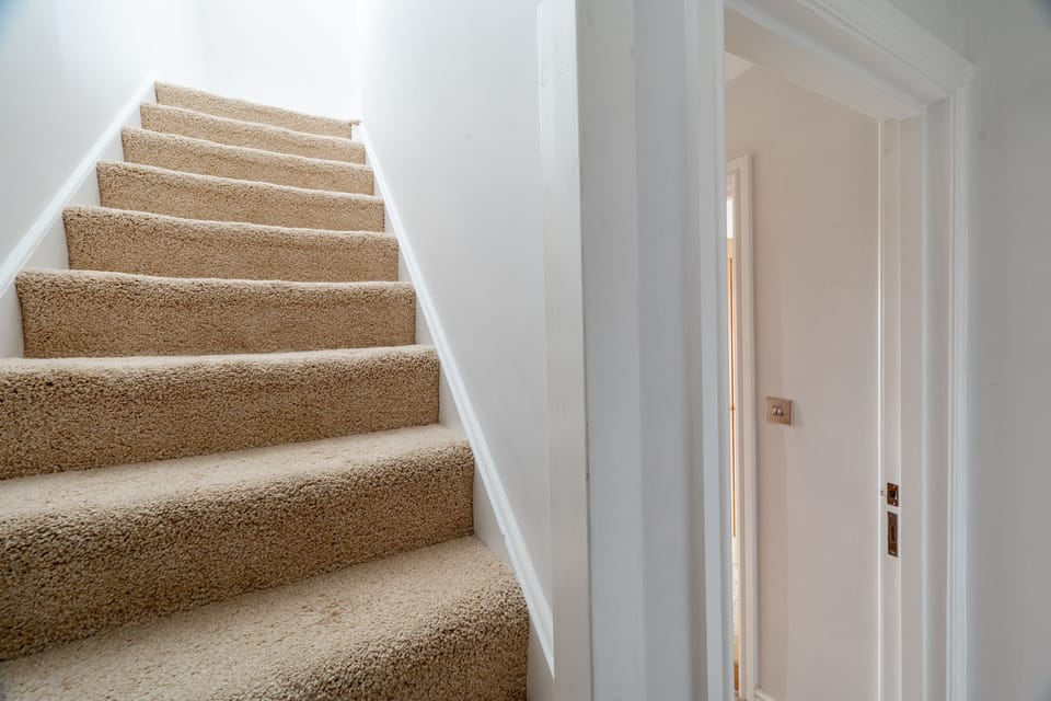 First floor: Stairwell access to the second floor
