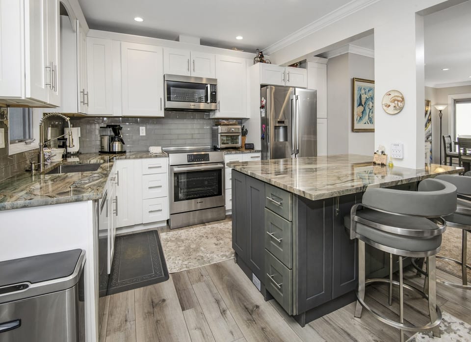 Townhome, 4 Bedrooms | Private kitchen | Coffee/tea maker, fridge, oven, toaster