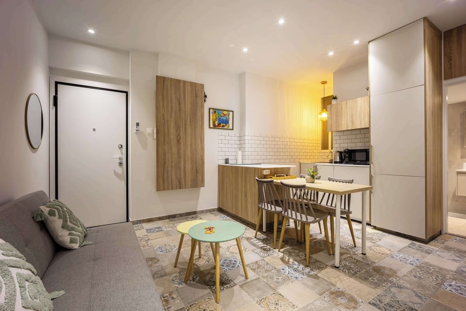 Warm lighting and modern design create an inviting gathering space for shared meals and memorable moments.