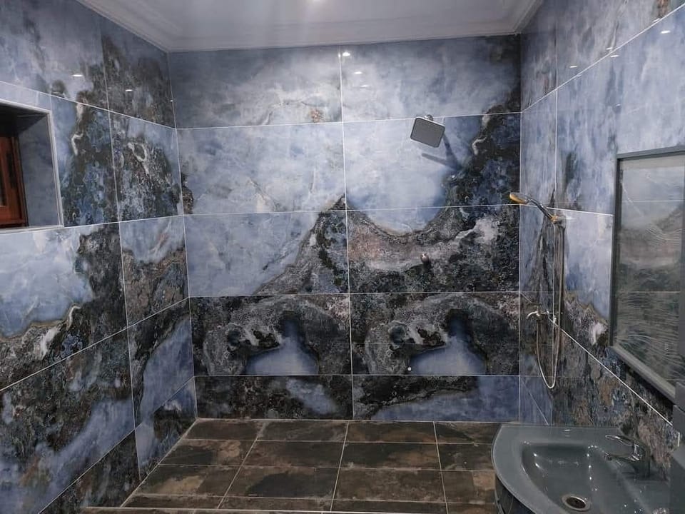 Deluxe Double Room, Patio, Garden View | Bathroom | Shower, bathrobes, towels, soap