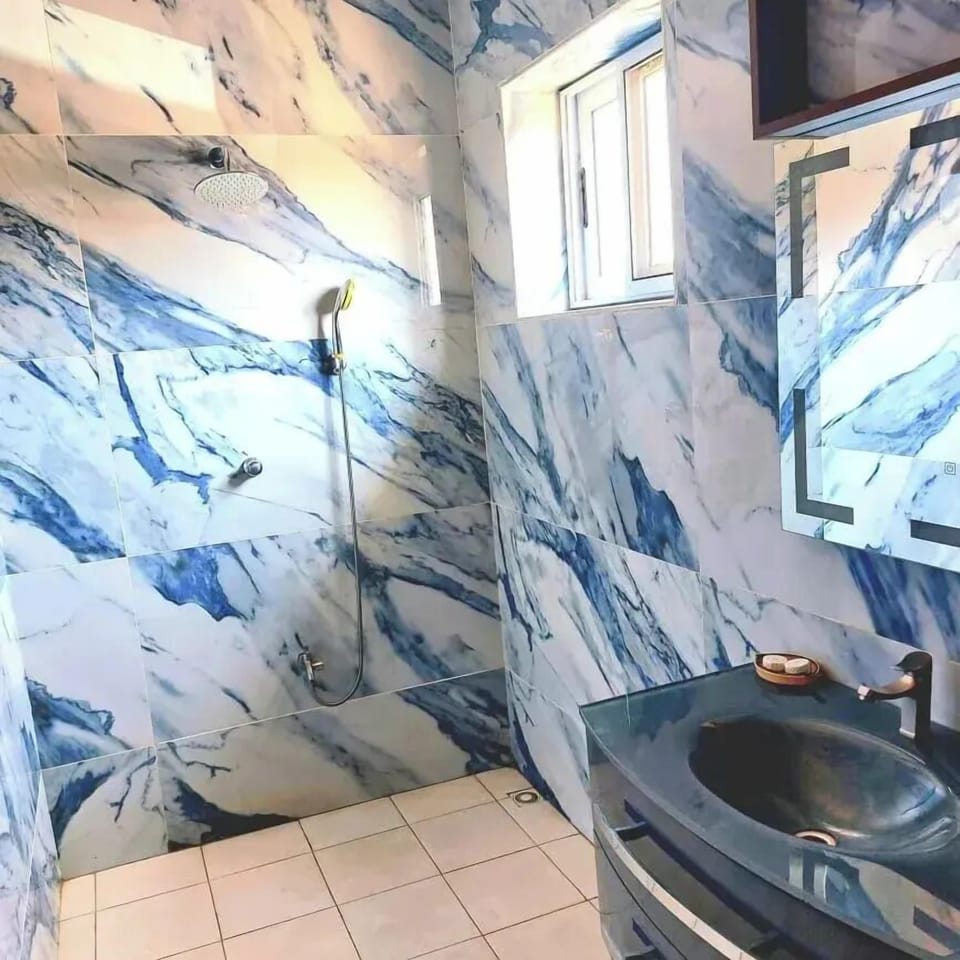 Deluxe Double Room, Patio, Garden View | Bathroom | Shower, bathrobes, towels, soap