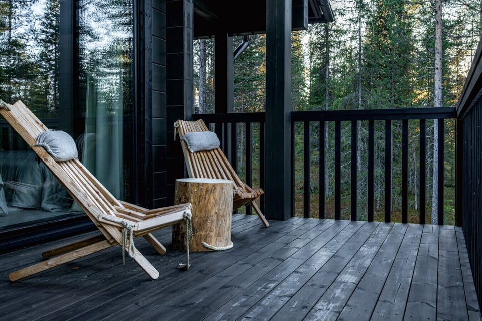 Relax in these stylish wooden lounge chairs and let the tranquility of nature surround you.