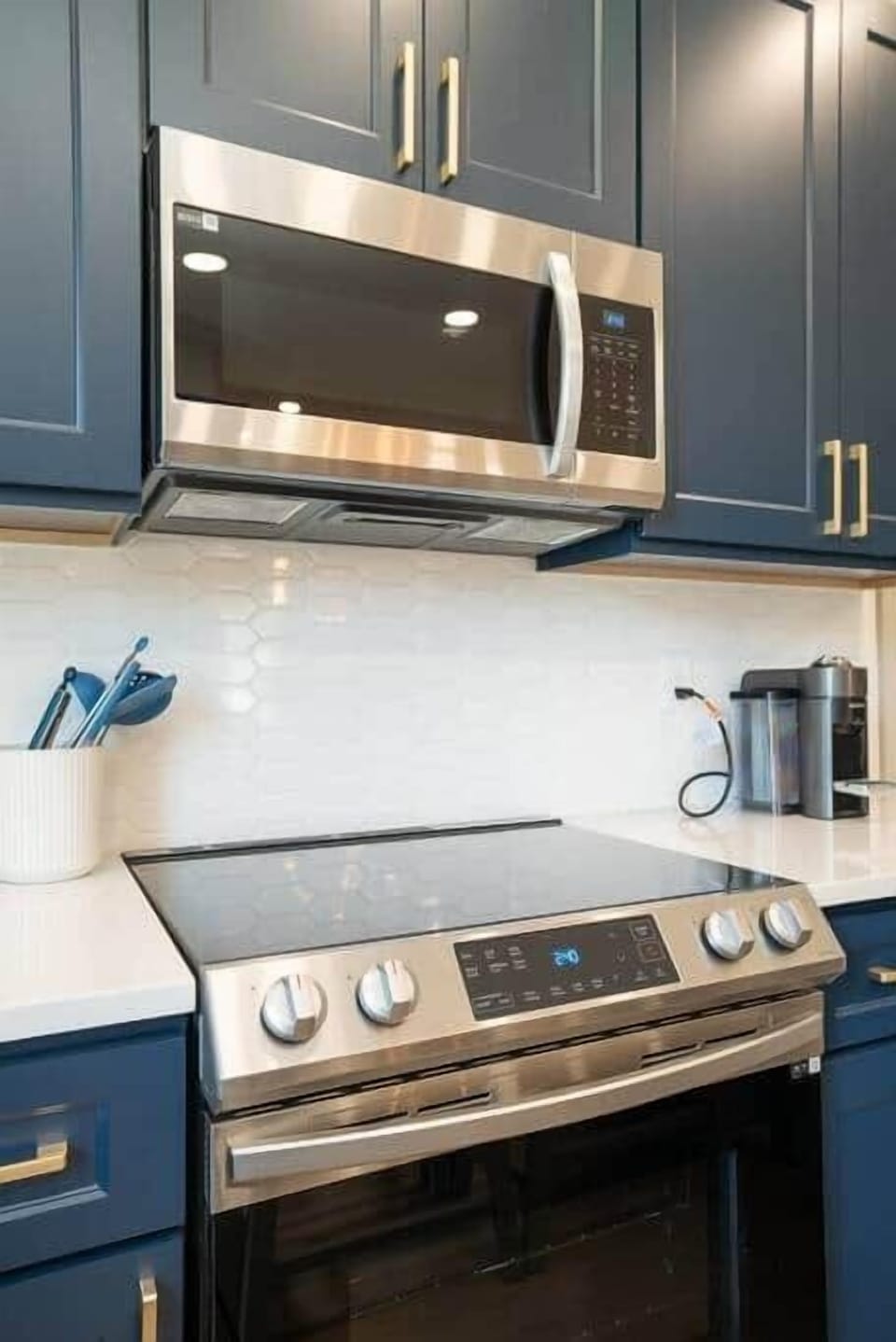 Samsung microwave and electric range. 