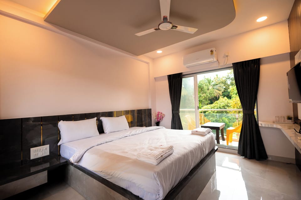 Deluxe Double Room, Balcony, City View | Desk, laptop workspace, free WiFi