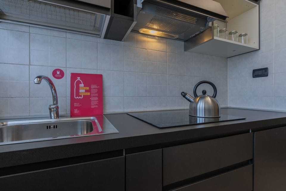 Apartment, 2 Bedrooms, Balcony | Private kitchen | Fridge, microwave, stovetop, dishwasher
