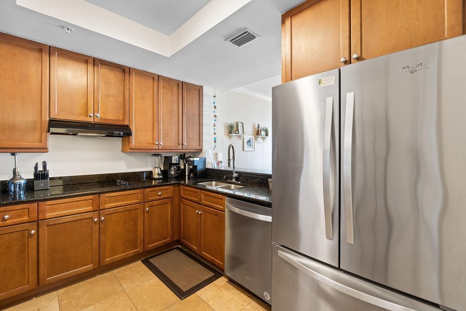Condo, Multiple Beds (Indigo East 1003) | Private kitchen | Oven, toaster