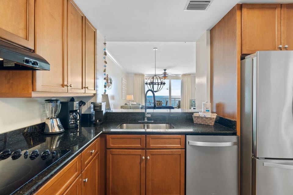 Condo, Multiple Beds (Indigo East 1003) | Private kitchen | Oven, toaster