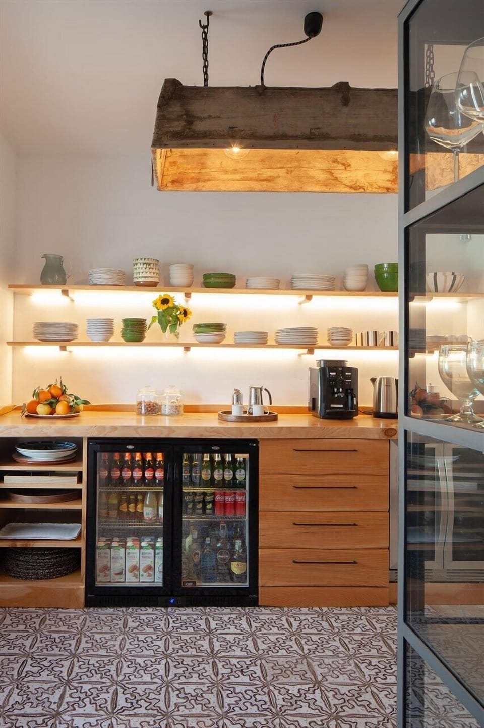 Part of the kitchen is given over to a bar area.