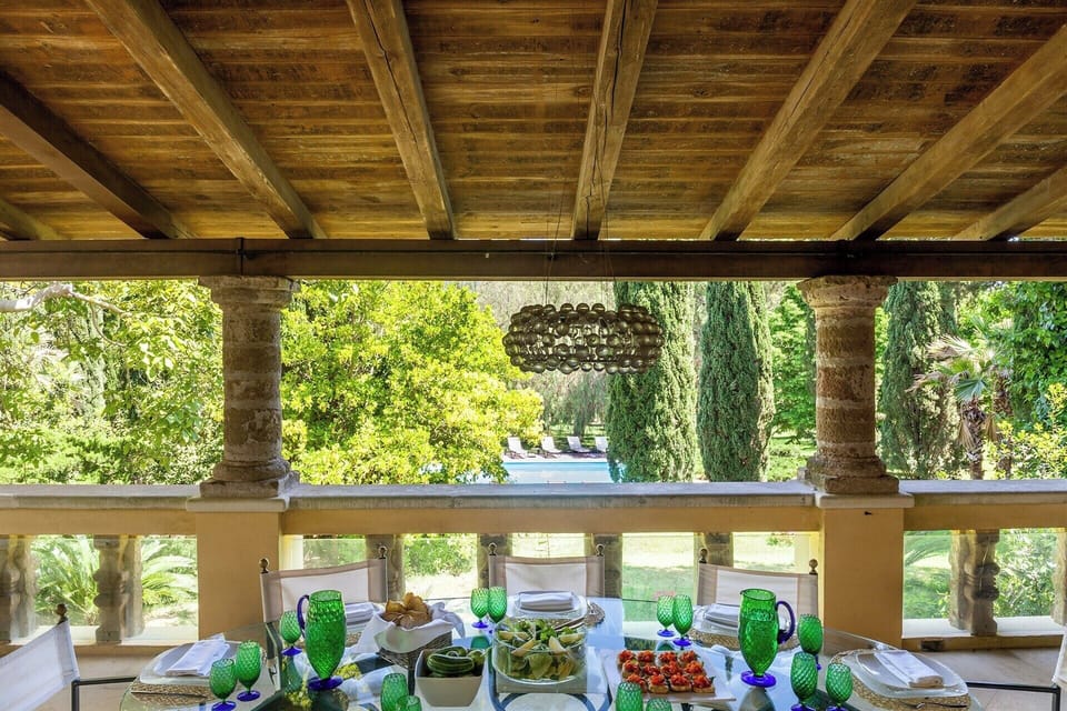 The main al fresco dining area looks out over the gardens.