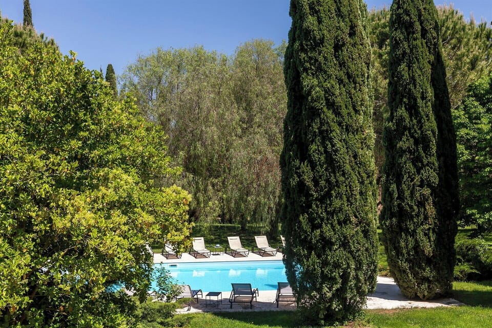 The pool and the extensive, manicured gardens are a delight to behold.