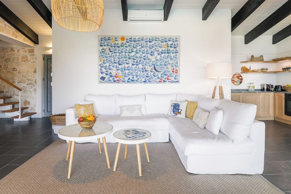 The comfy L-shaped sofa in the open-plan communal space.