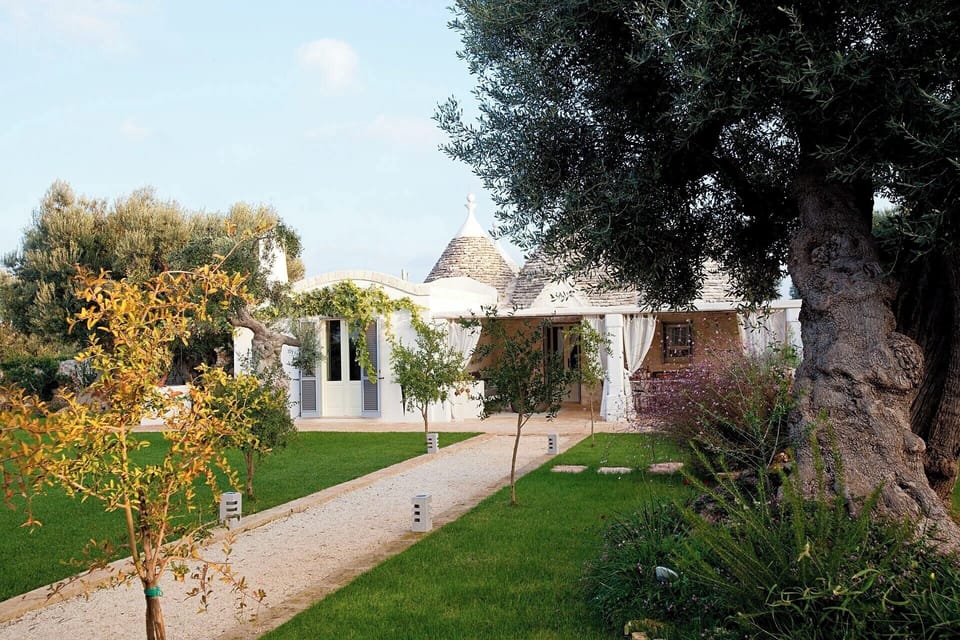The trulli seen from the gardens.