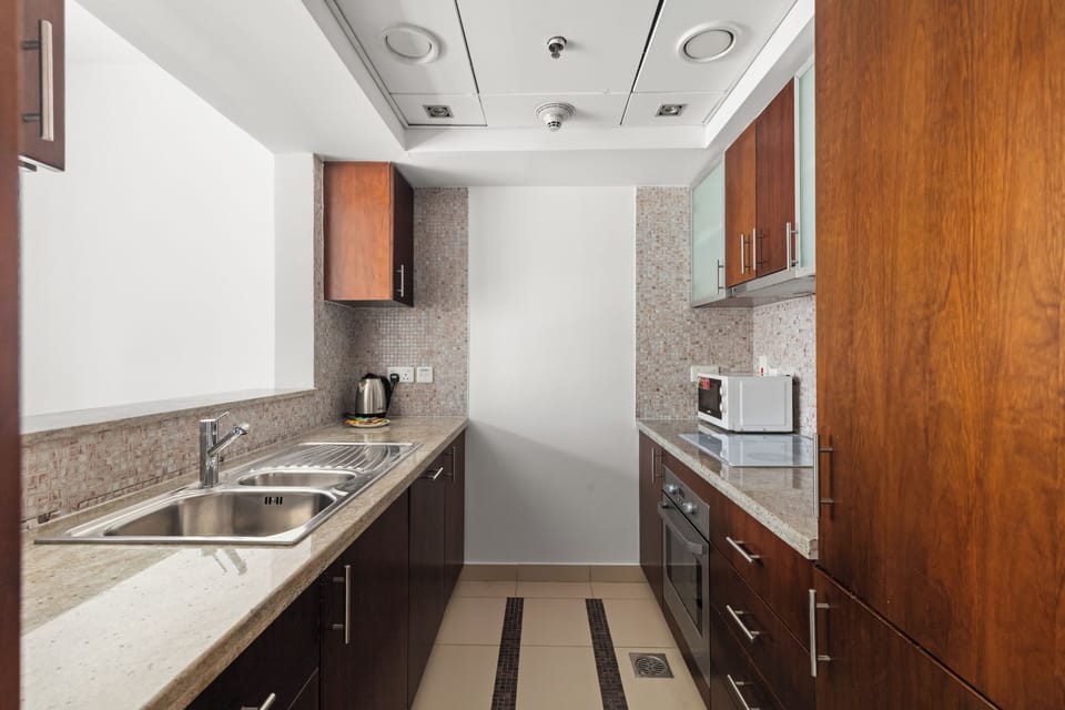Classic Apartment, Courtyard View | Private kitchen | Full-size fridge, microwave, oven, stovetop